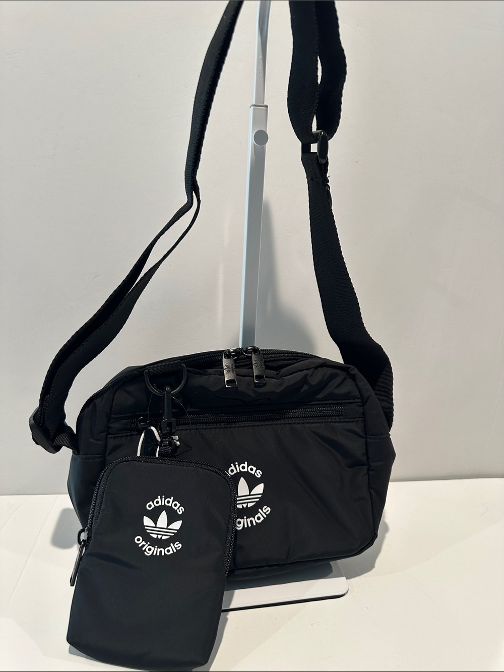 NWT Adidas Black/White Puffer and Pouch Crossbody Bag with inside zipper pocket.